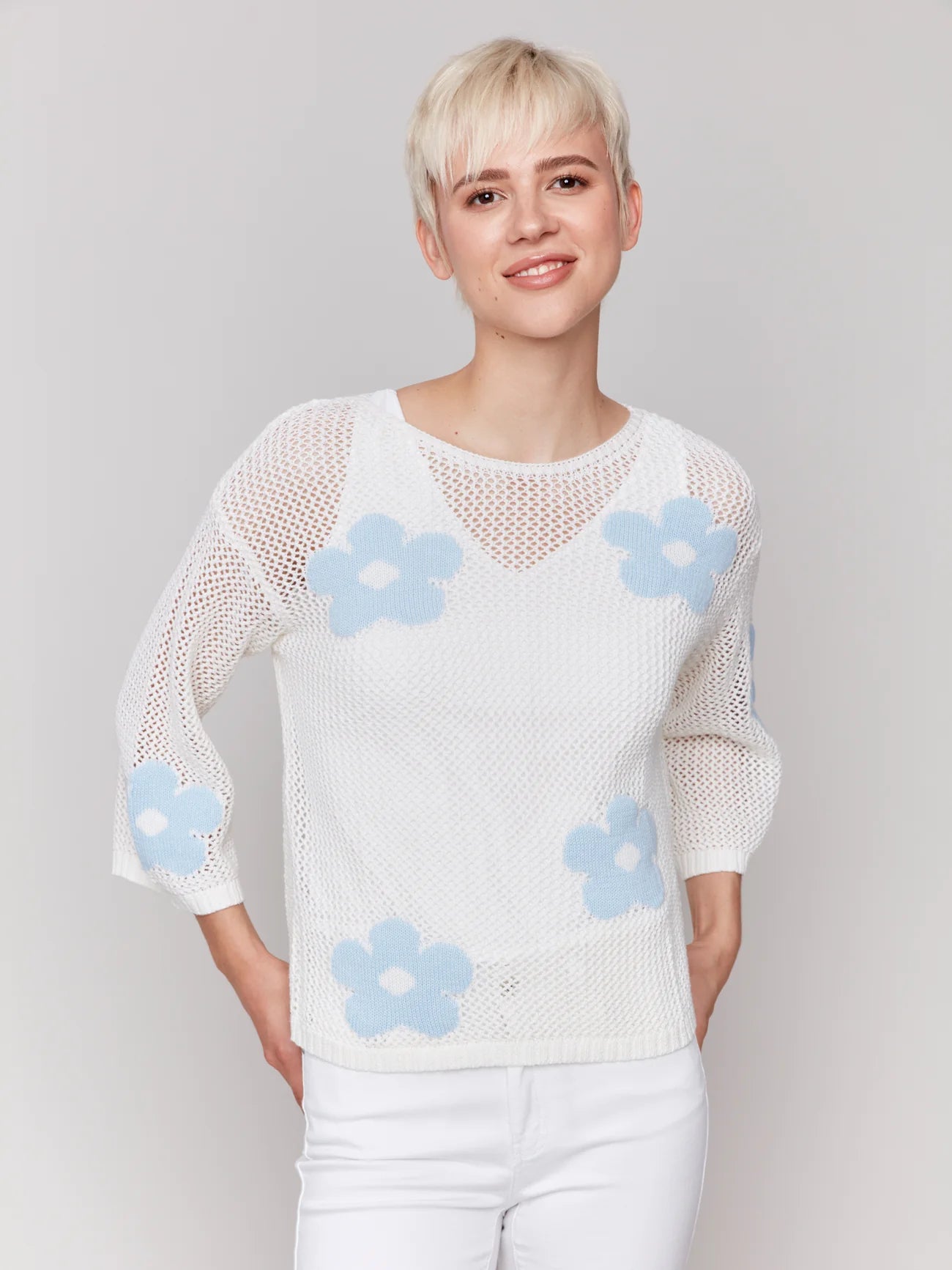 Knit sweater with blue flowers