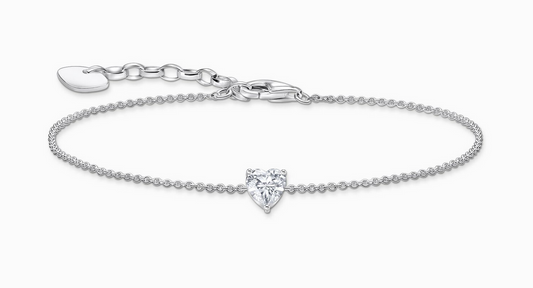 Silver bracelet with white heart-shaped pendant