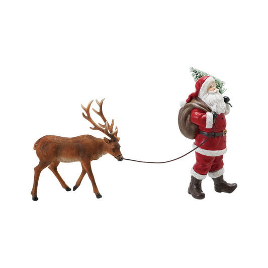 Santa and reindeer statue